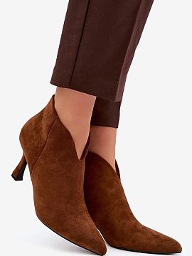 Heel boots Step in style  Low women\'s ankle boots made of eco suede are an elegant proposal for women who appreciate style, comfort, and a timeless look. The soft ma
