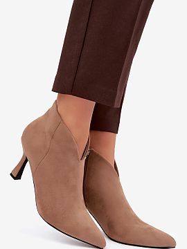 Heel boots Step in style  Low women\'s ankle boots made of eco suede are an elegant proposal for women who appreciate style, comfort, and a timeless look. The soft ma