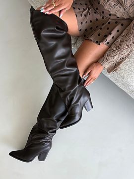 Heel boots Step in style  Eco leather boots are a fashionable proposition for cooler days for women who like stylish footwear with a looser shaft. The model is slip-o