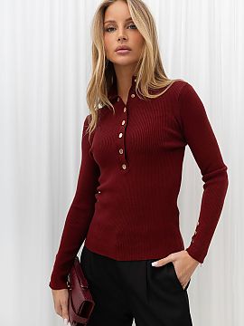 Jumper Italy Moda  An elegant women\'s sweater made of elastic, ribbed fabric is a versatile option for everyday wear and work. The model of standard length ha
