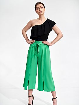 Women trousers Figl  Bell-bottomed pants 7/8, decorative slit in the front at the bottom of the leg. Waistband with sewn in elastic band with decorative binding.