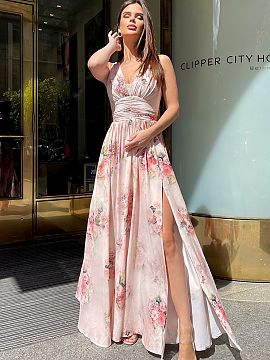 Long dress Bicotone  Long dress, made of airy fabric, dyed in beautiful flowers. The top has a delicate neckline, the bottom is double-layered with a slit on the
