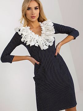 Cocktail dress Lakerta  Pencil cut dress with 3/4 sleeves, zippered. The dress is made of pea fabric, with decorative lace on the front. An ideal choice for many oc