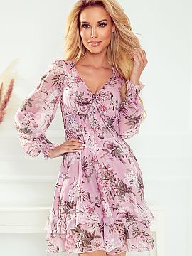 Daydress Numoco  Chiffon dress with elastic waist and sleeves. The neckline, which can be tied at will, adds to the charm. Patterned with pink flowers on a p