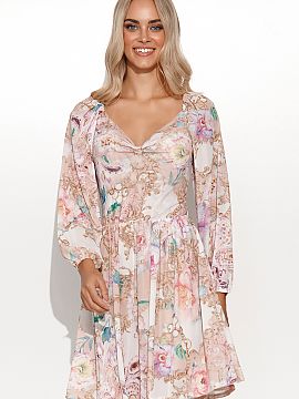 Daydress Makadamia  An airy dress with an extremely girly cut. It has a long, slightly buff sleeve. In the front you can see a rather high-cut neckline, with th