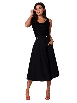 Skirt BeWear  A flared midi skirt with a high waist and decorative buttons. The skirt is fastened with a covered zipper.