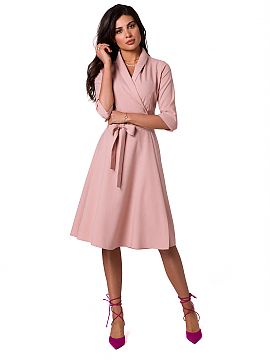 Daydress BeWear  Extremely feminine envelope cut dress with a flared bottom and shawl collar, tied at the waist with a belt.