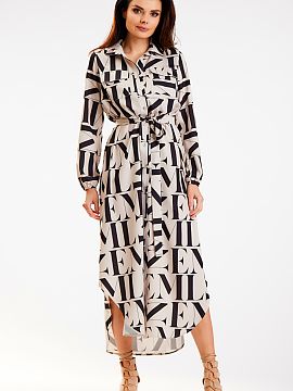 Daydress awama  Shirt maxi dress with two pockets. Long sleeve finished with an elastic band. Fastened with gold round buttons. It comes with a belt sewn fr