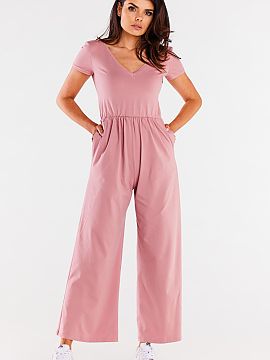 Suit Infinite You  Wide-legged jumpsuit made of very pleasant and soft knit fabric. Top with short sleeves and a heart neckline. Crinkled with elastic at the w