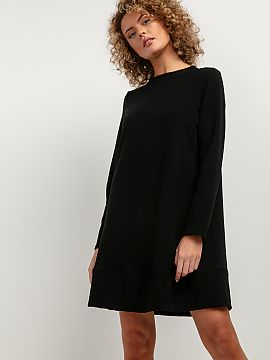 Daydress Tessita  Knitted dress before the knee with trapezoidal cut is a great option for the autumn season. Careful finishing, a stand-up neckline, darts in