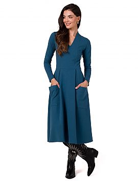 Daydress BeWear  This dress is a combination of elegance and comfort. The fitted top with profiling topstitching and deep V neckline accentuates the silhouet